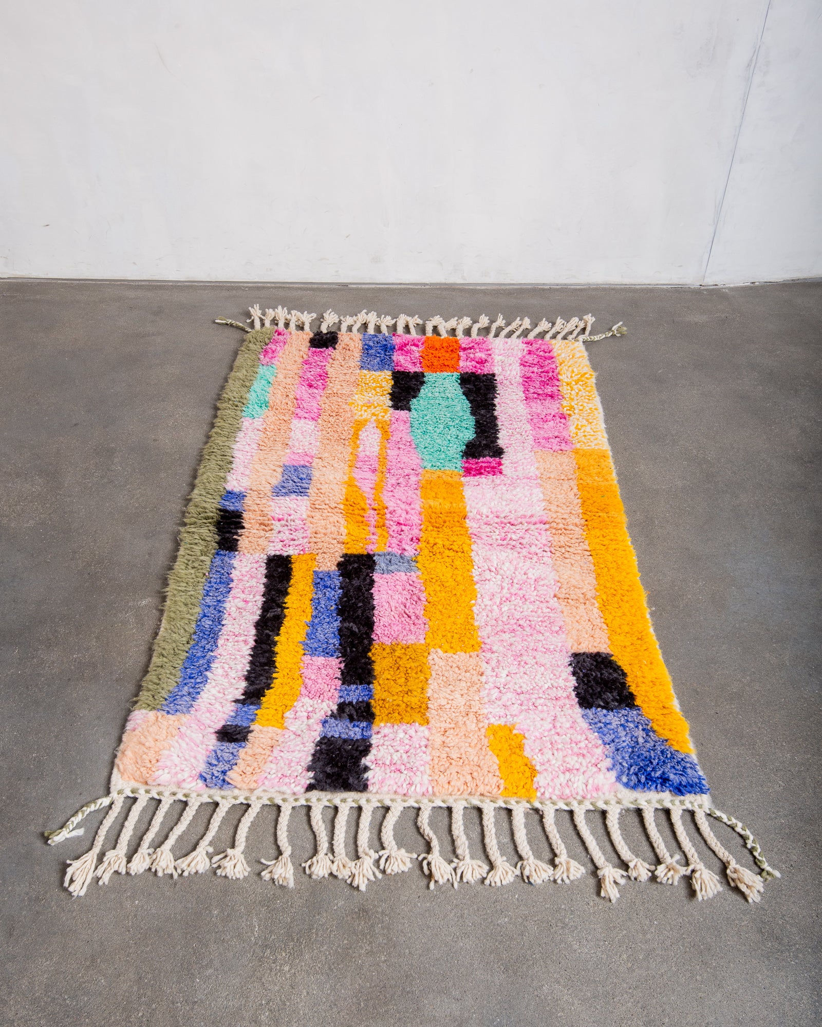 Modern, designer, handcrafted Berber rug from Morocco. Beniourain carpet with beautiful colours and patterns and fluffy wool texture.